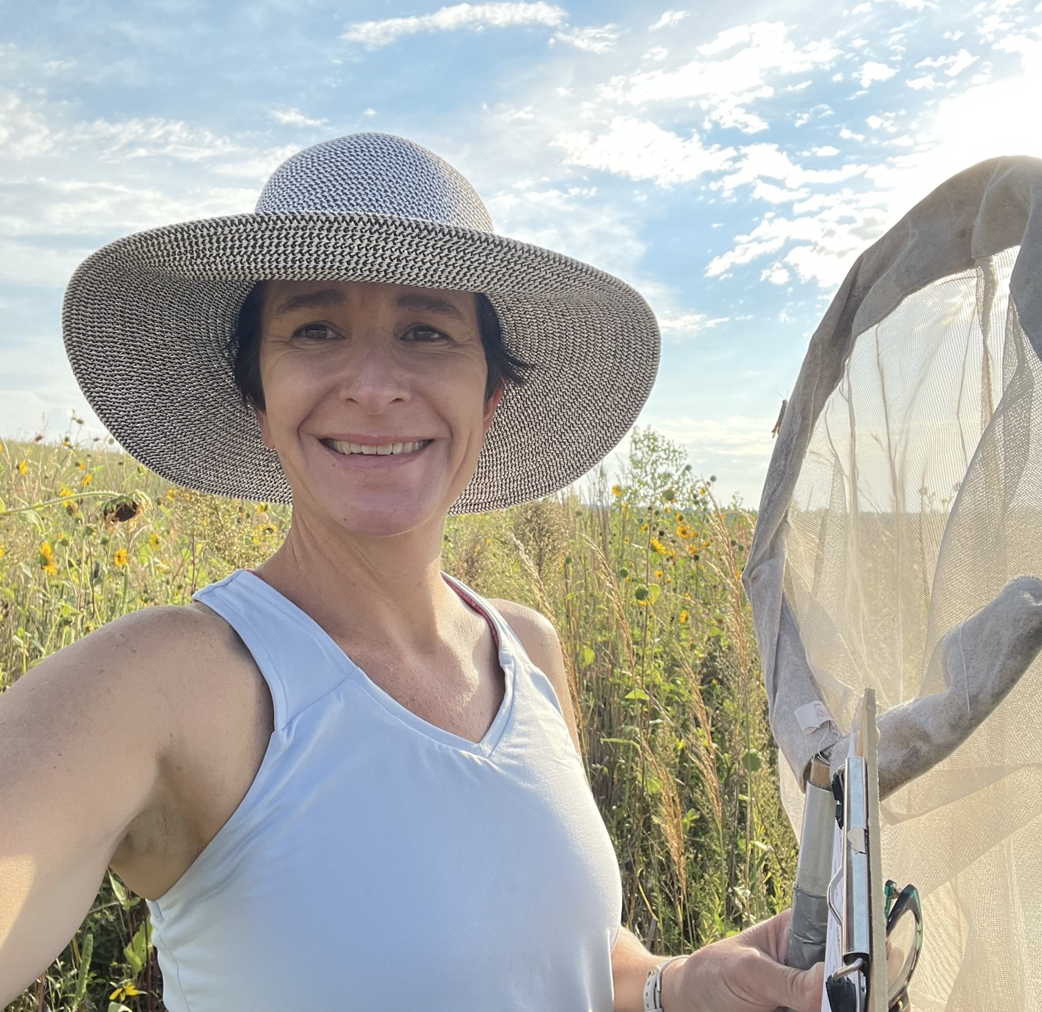 Headshot of person with butterfly net.