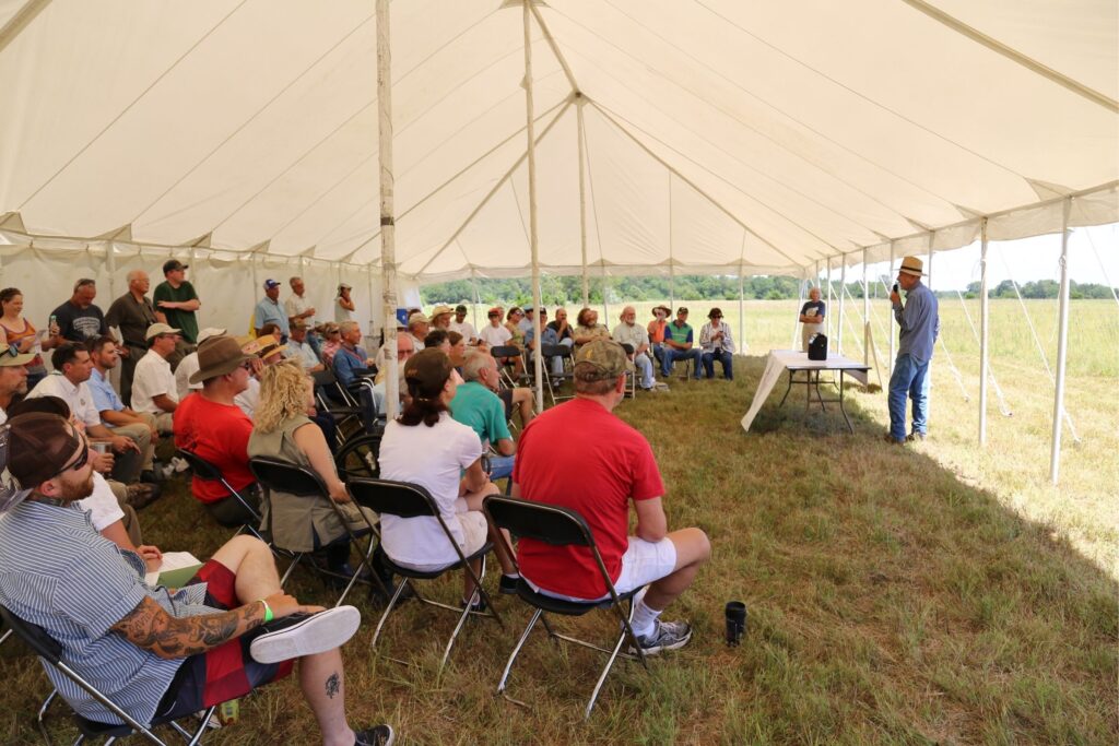 Noah Brown speaking at prairie dedication.